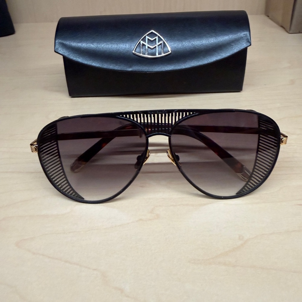 Elegant Black Sunglasses with Gold Accents